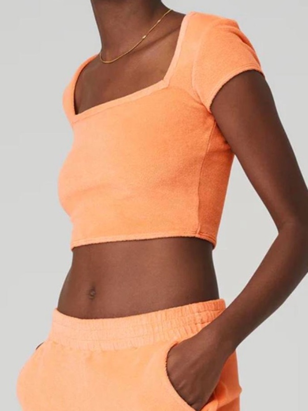 Alo Yoga Terry Beachside Short Sleeve Top size Medium in Cantaloupe Orange